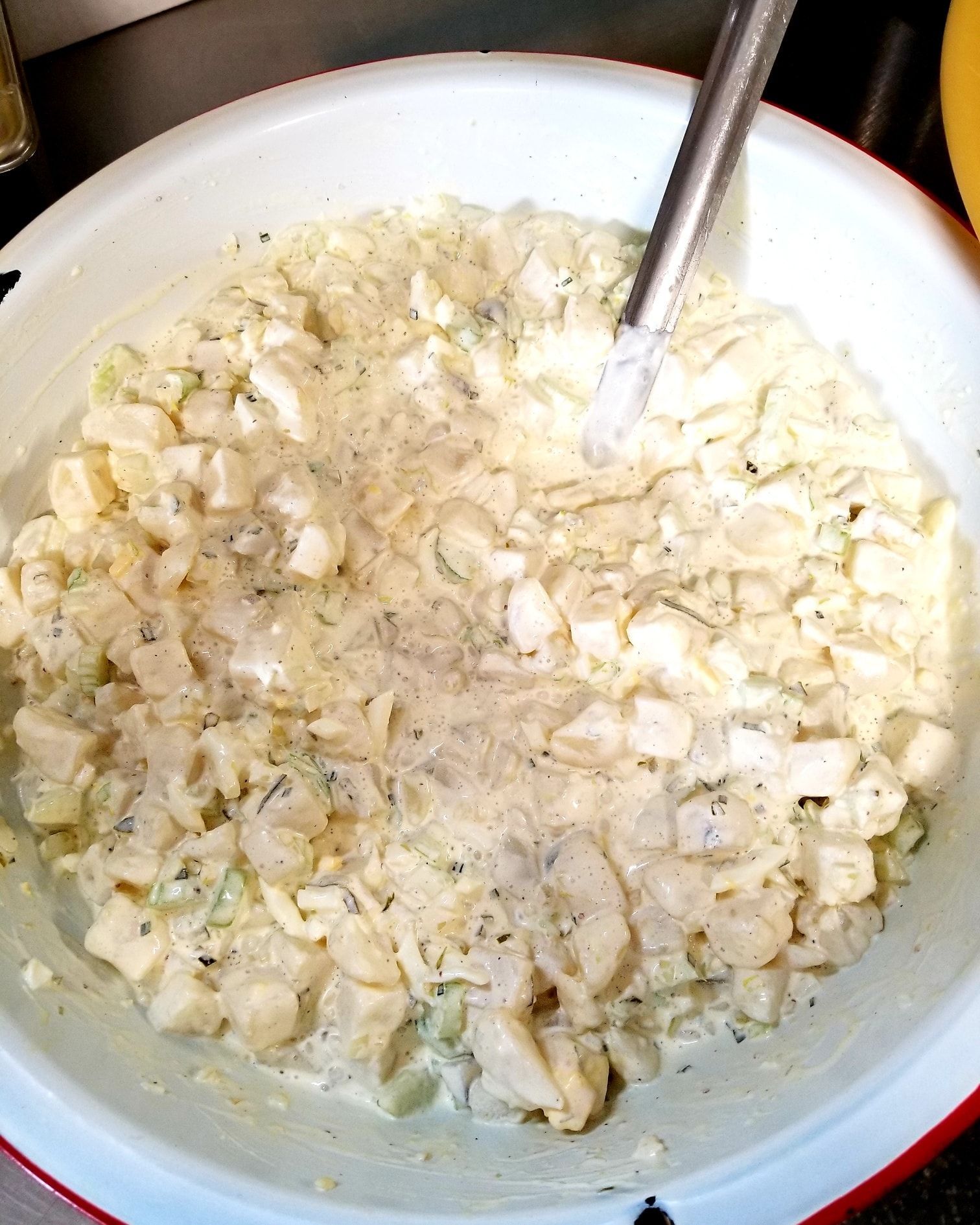 A bowl of food with a spoon in it