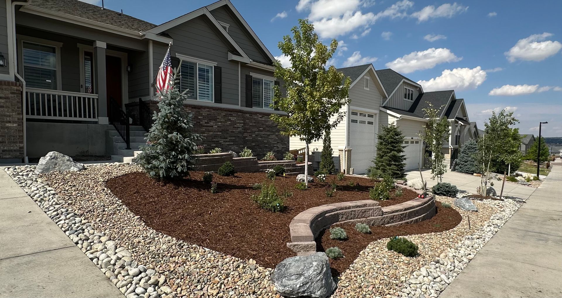 A house with an american flag in front of it