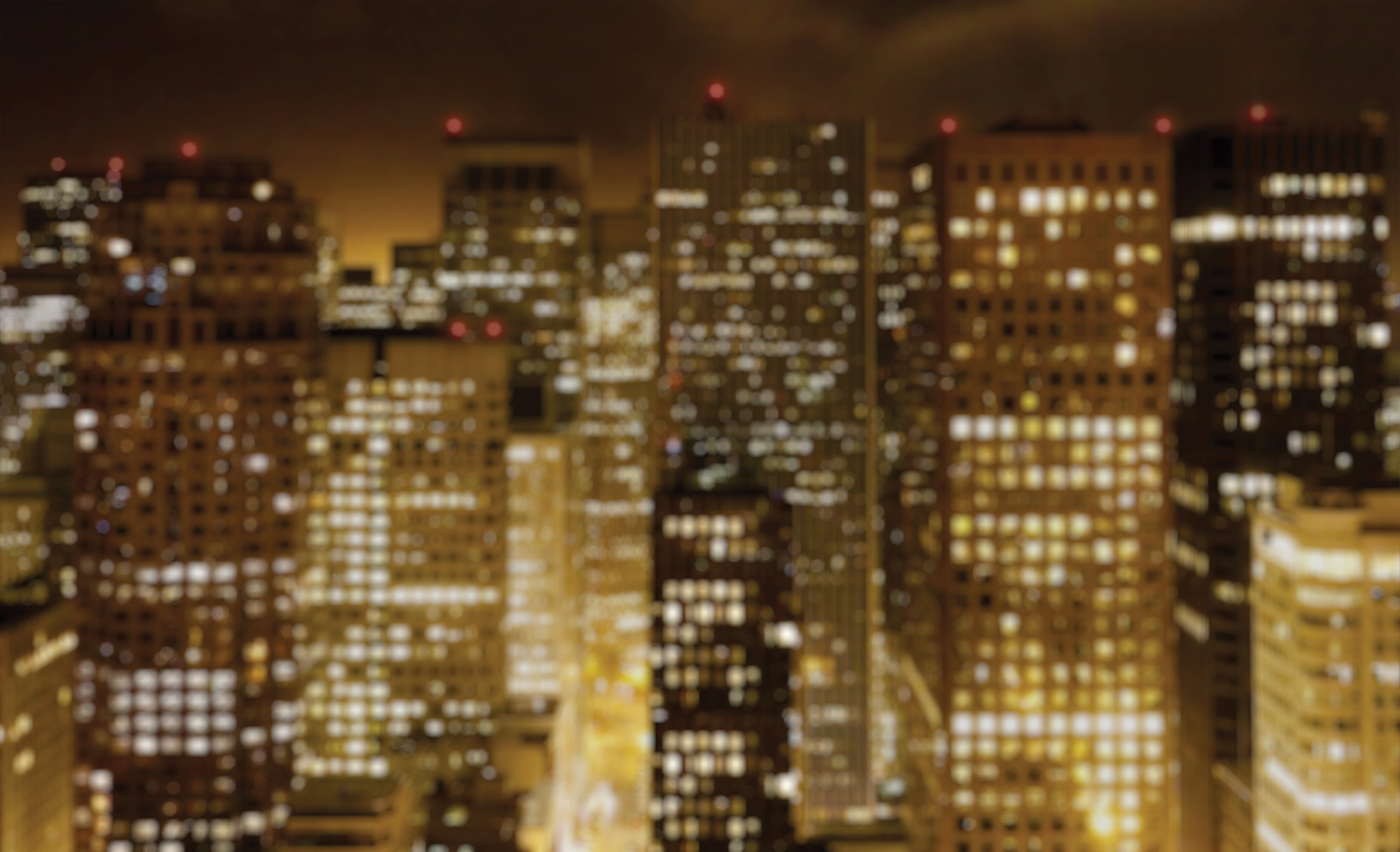 A blurry picture of a city skyline at night