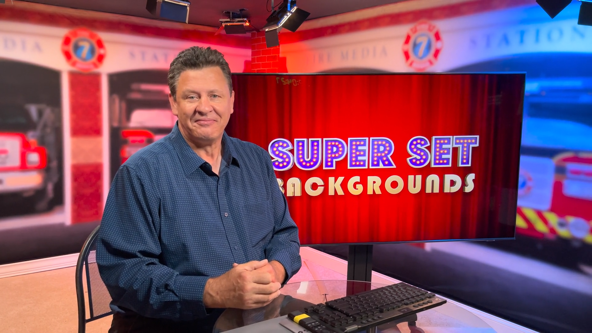 A room with a tdgr.tv logo on the wall