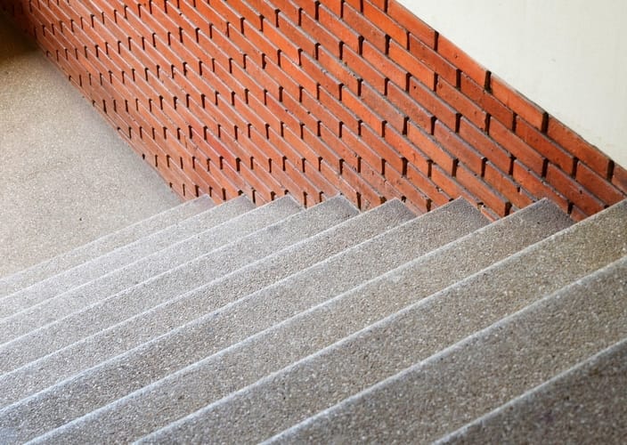 An industrial property with stairs made with exposed aggregate concrete in Gisborne VIC.
