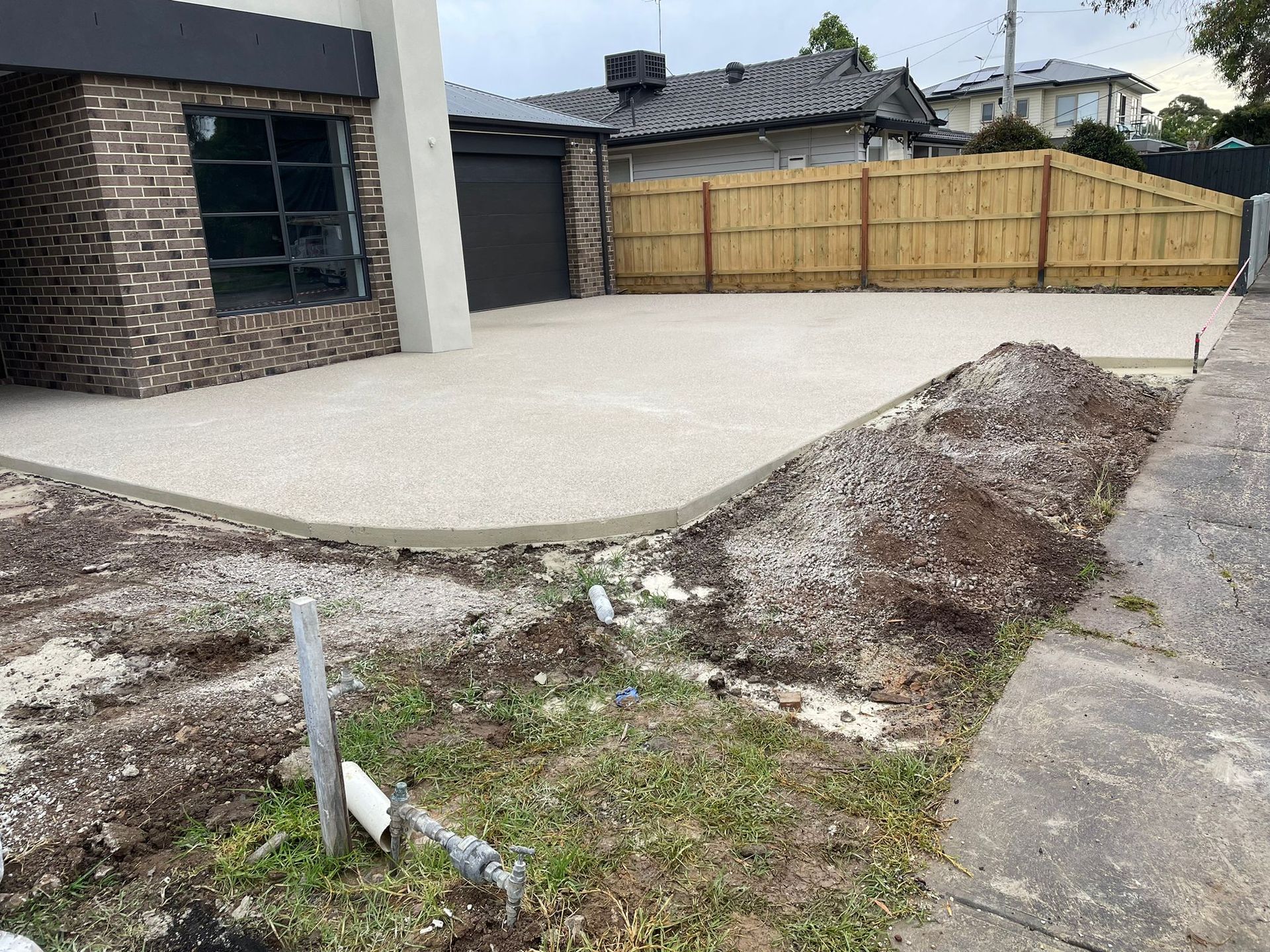 Newly repaired concrete driveway of a residential property in Melton VIC.