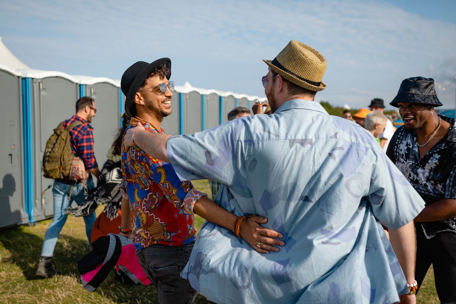 A portable toilet rental for a music event.