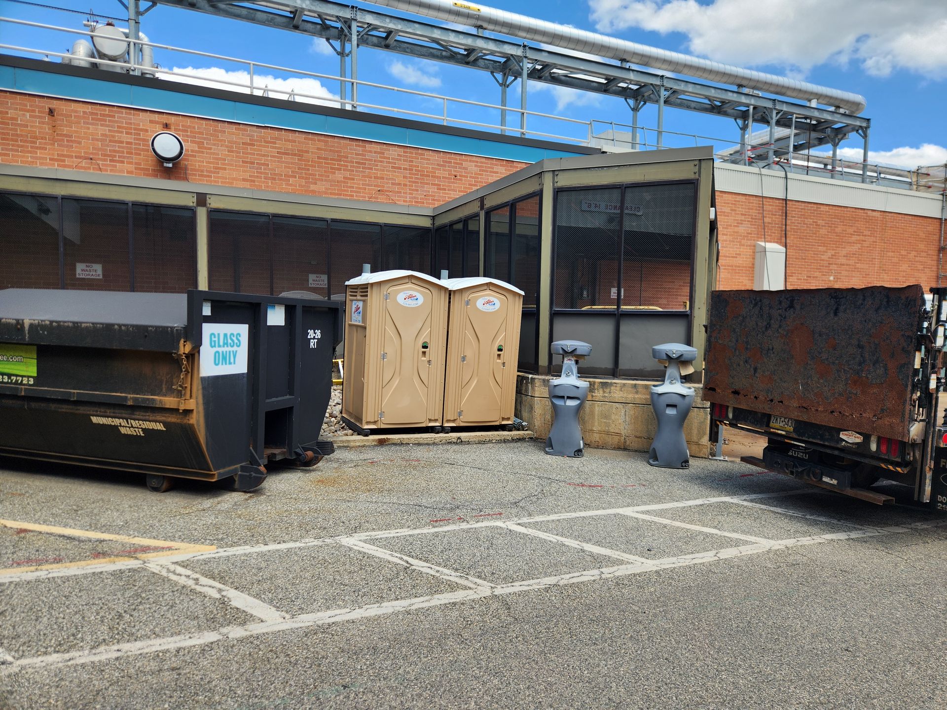 View of portable toilets on external facility