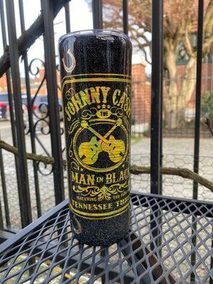Glittery black tumbler with a Johnny Cash