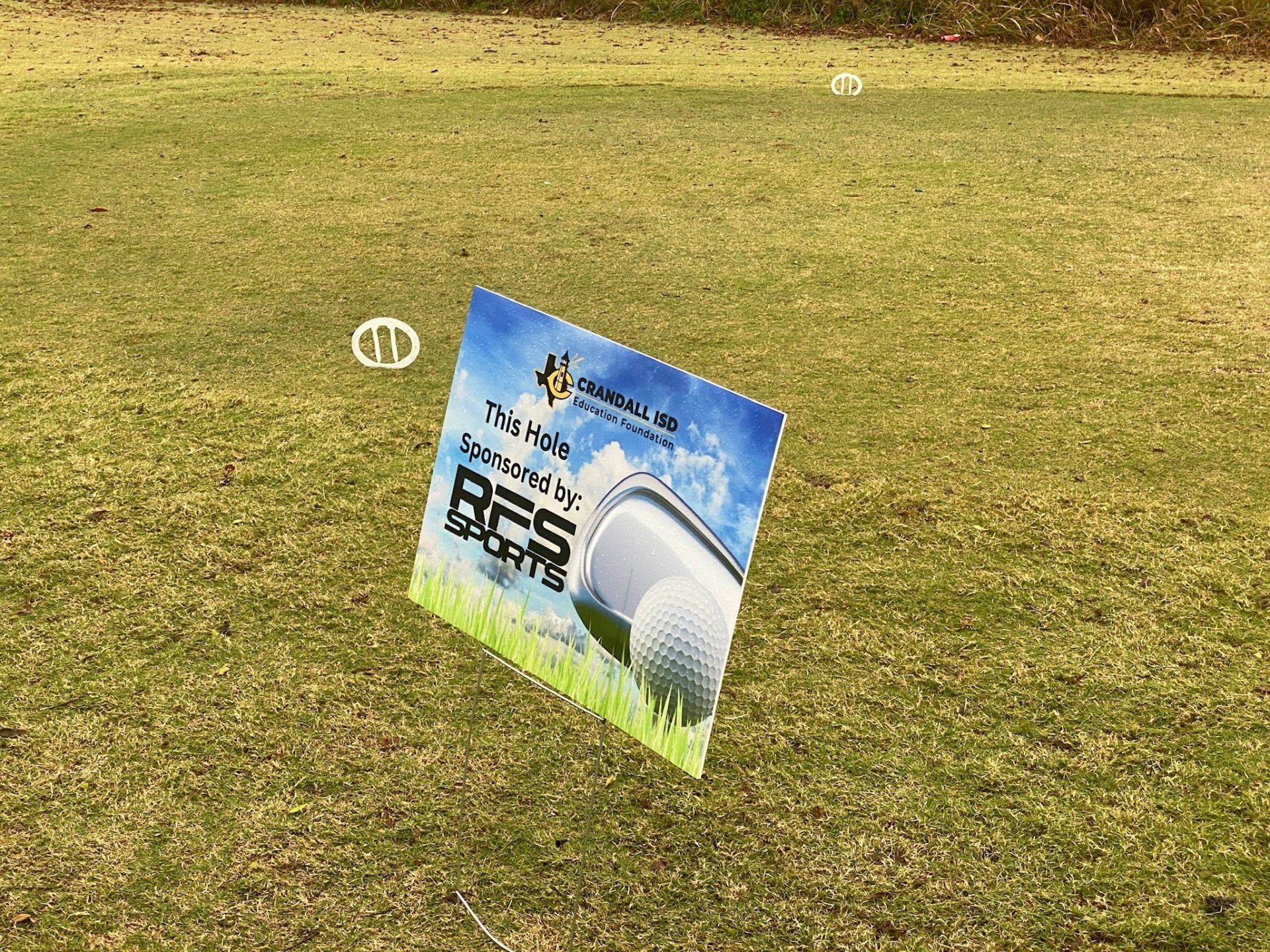 Sign at a golf course advertising 