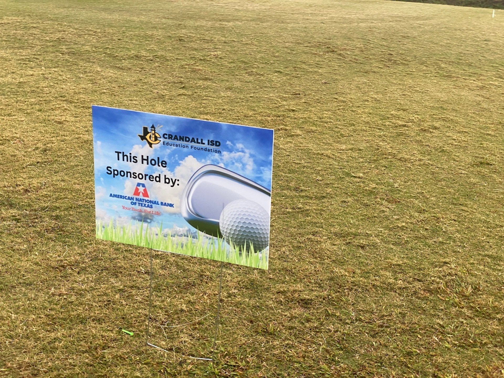 Sign on golf course: 