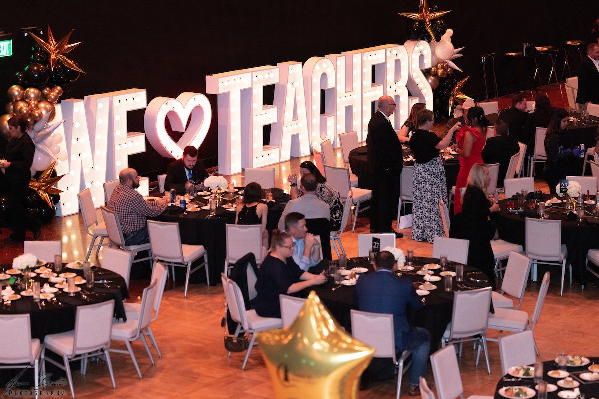 Event with round tables, people, and a 