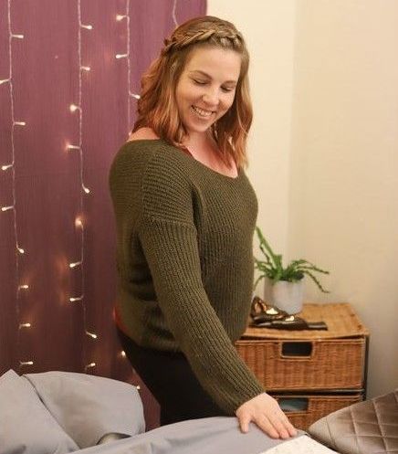 A woman is getting a massage at a spa. A woman is getting a massage at a spa.