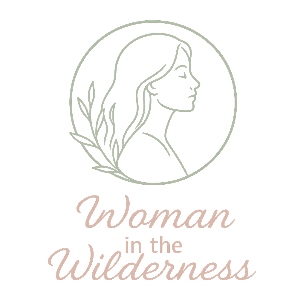 Line drawing of a woman's profile inside a circle with a sprig of leaves. Text: Woman in the Wilderness.