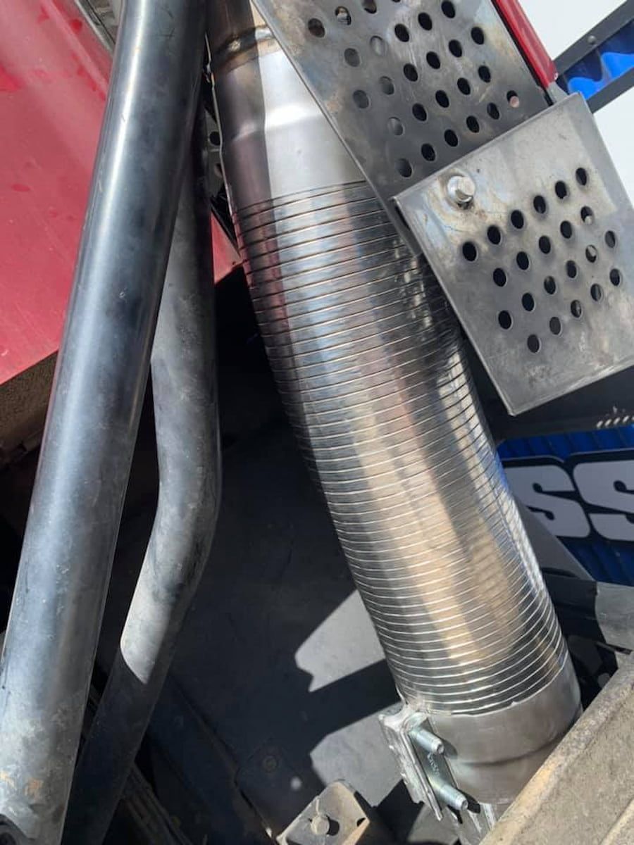 A Close Up Of A Exhaust Pipe On A Motorcycle — Hannam Street Mufflers and Mechanical In Bungalow, QLD
