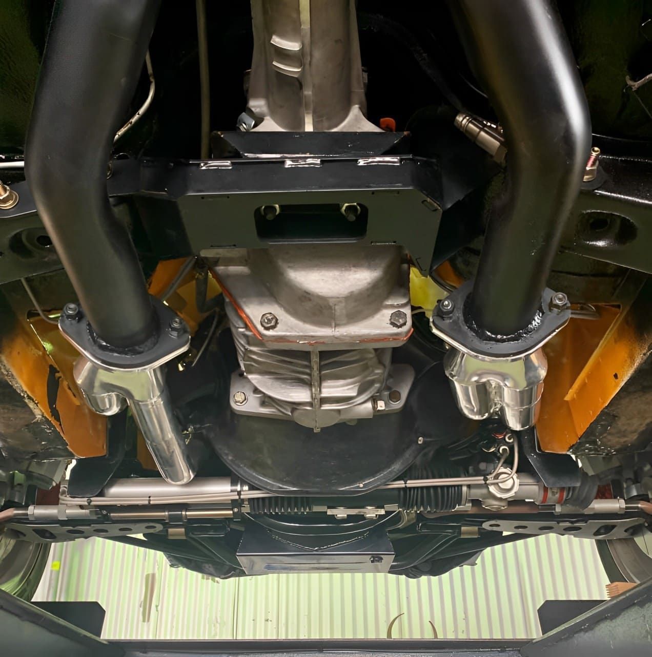 A Close Up Of The Underside Of A Car — Hannam Street Mufflers and Mechanical In Bungalow, QLD