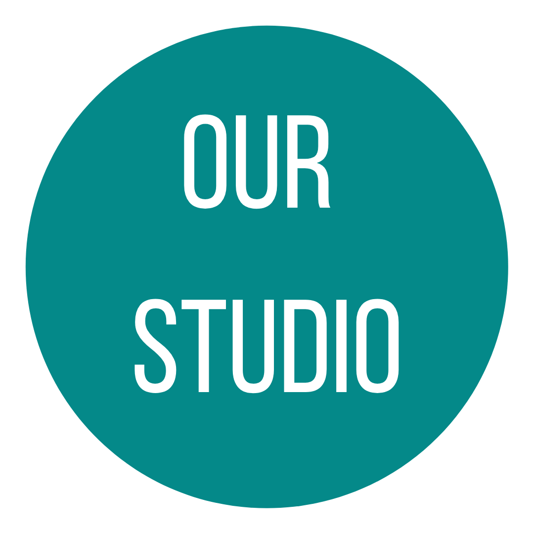 A blue circle with the words our studio on it