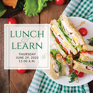 a plate of sandwiches on a table with the words lunch & learn on it