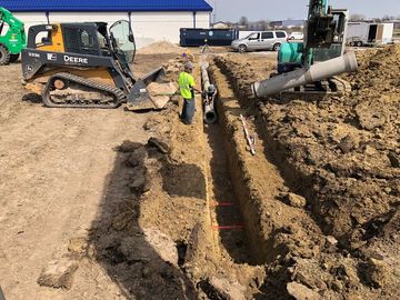 Excavator on earthmoving during construction - Springfield, IL - Jaren Industries