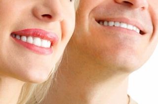 Couple Smiling — Dental Services in Bridgewater, MA