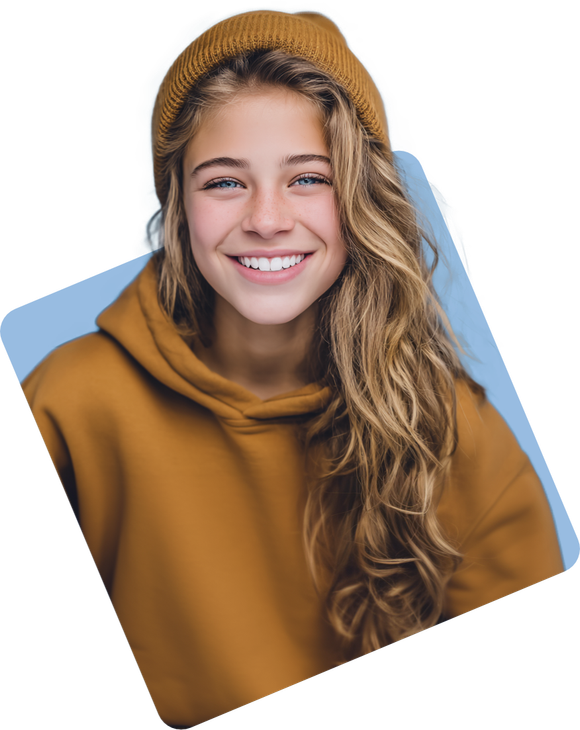 Smiling girl in a brown beanie and hoodie, long wavy blonde hair, blue background.