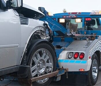 Towing Car - Auto Body Repair in Hewlwtt, NY