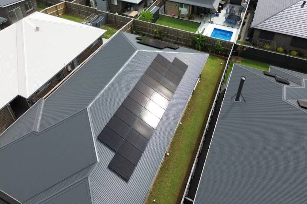 A House with Solar Panels on The Roof and A Satellite Dish — Podium Solar in Cameron Park, NSW