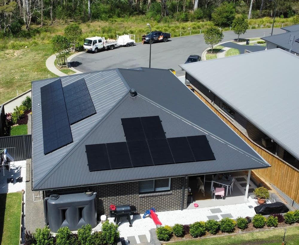 An Aerial View Of A House With Solar Panels — Podium Solar in Cameron Park, NSW