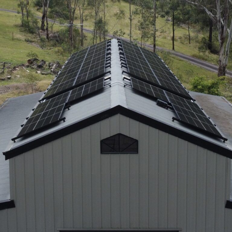 A Roof with A Lot of Solar Panels on It — Podium Solar in Chisholm, NSW