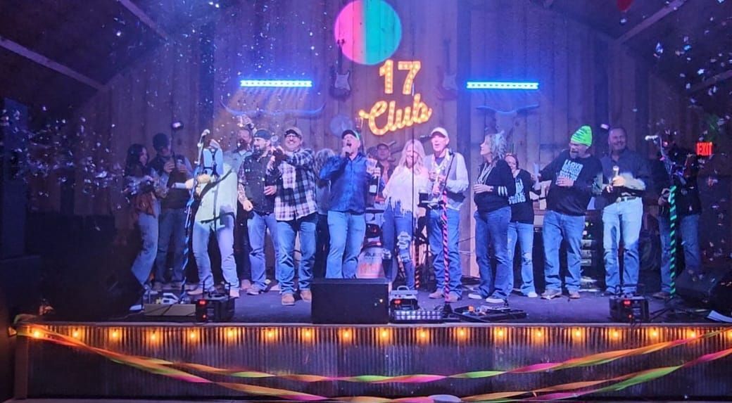 All of us taking the stage for a photo op at the 17 Club