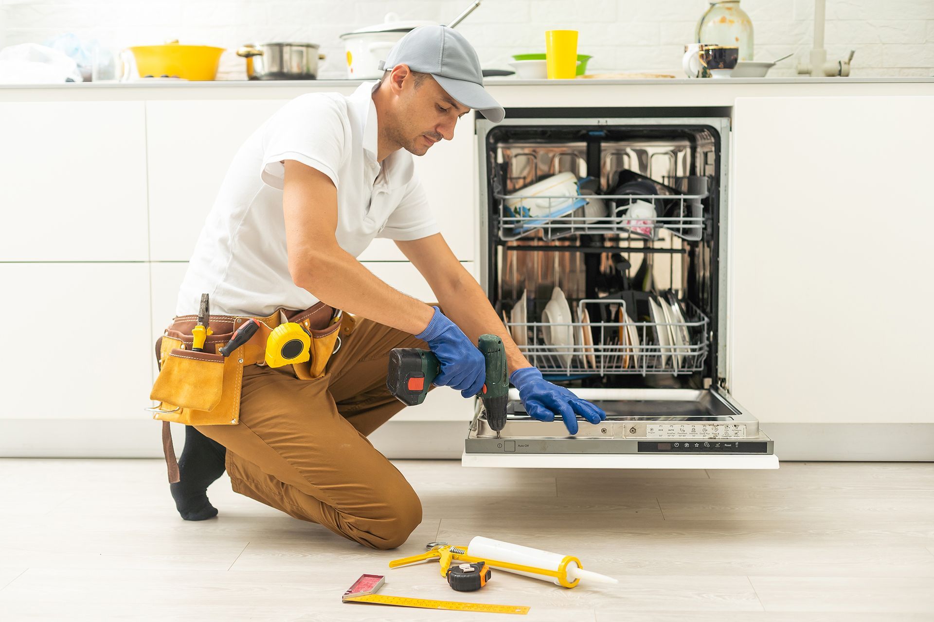 Man Repairing the Dishwasher