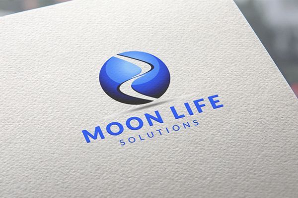 A logo for moon life solutions is on a piece of paper