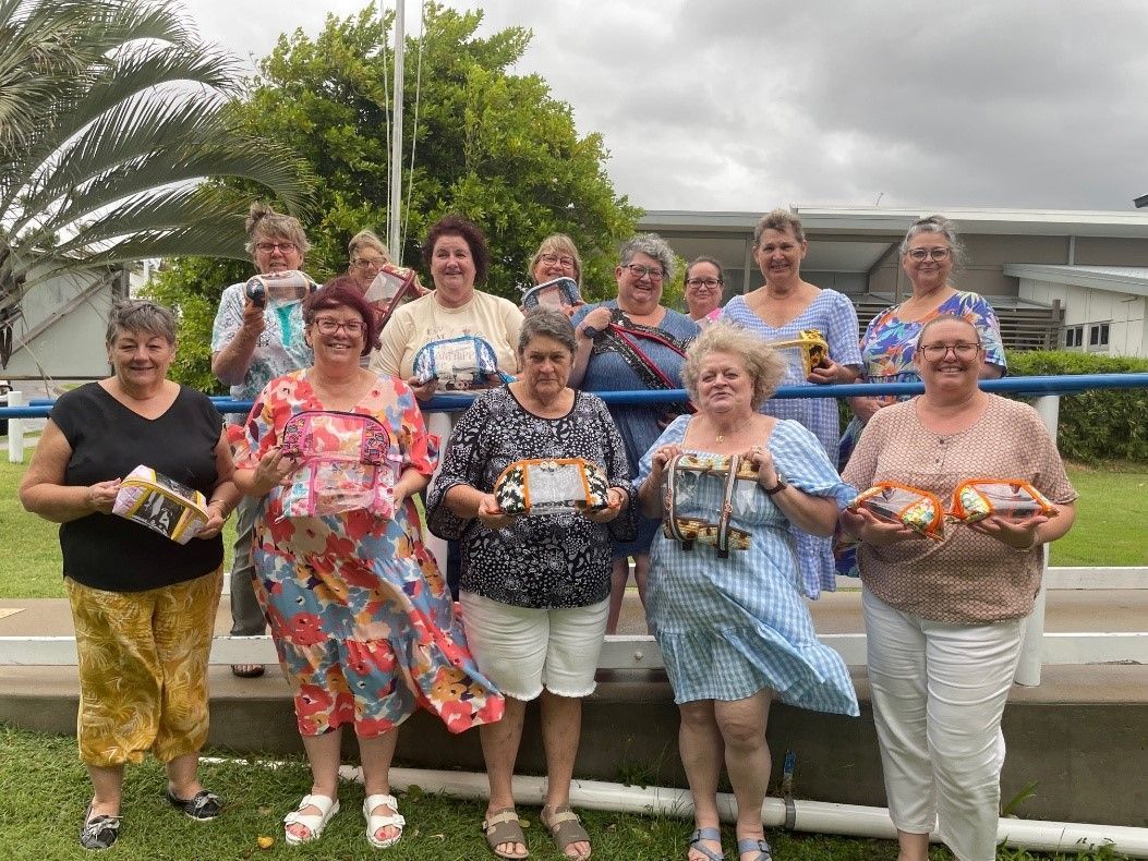Group of Women Are Posing for a Picture While Holding Boxes — Lyn-Jelle Crafts in Emu Park, QLD