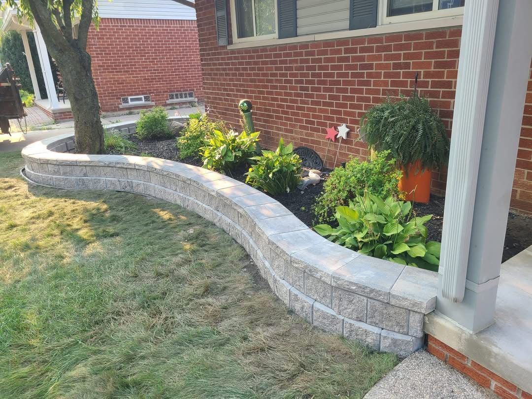 The front door of a brick house with a wreath on it.