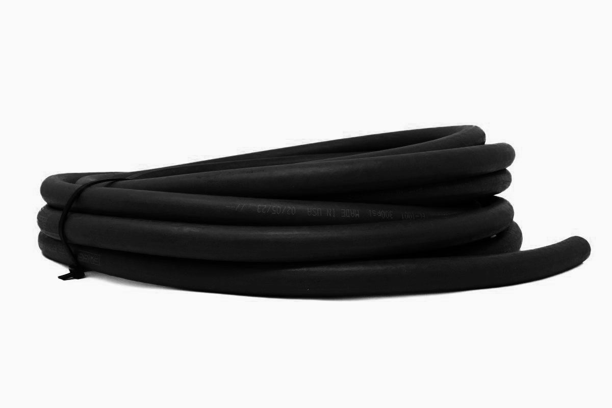 Coiled black corrugated flexible tubing.