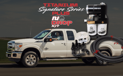 A white truck with a titanium signature series plus nu drop kit
