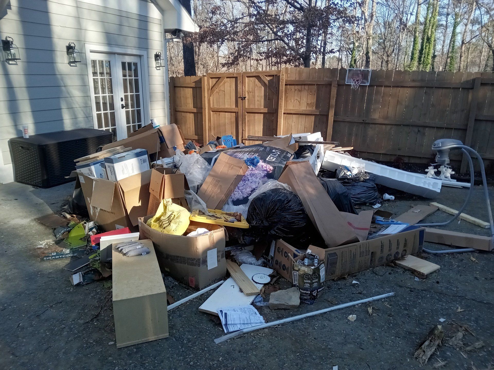 yard full of junk, yard waste removal, best junk removal company near me, atlanta georgia, pinnacle removal services