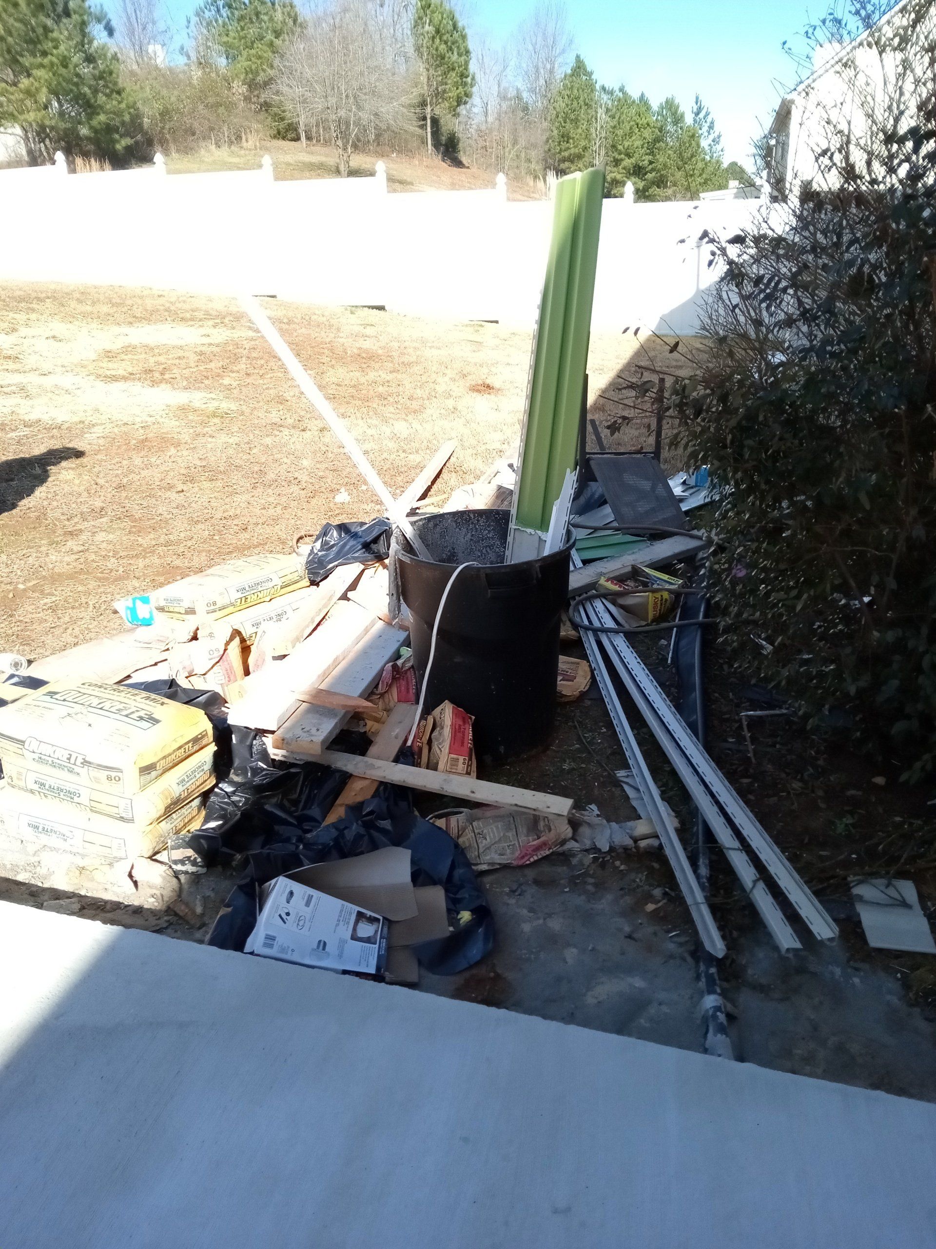 scrap metal and junk in yard, property cleanup, best junk removal services near me, atlanta georgia, pinnacle removal services