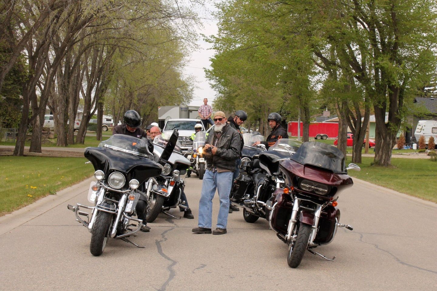 group photo of ride participants on motorcycles