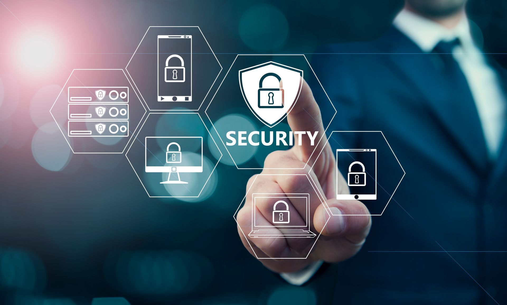 A person in a suit touches a digital, glowing interface displaying security icons for devices and servers.