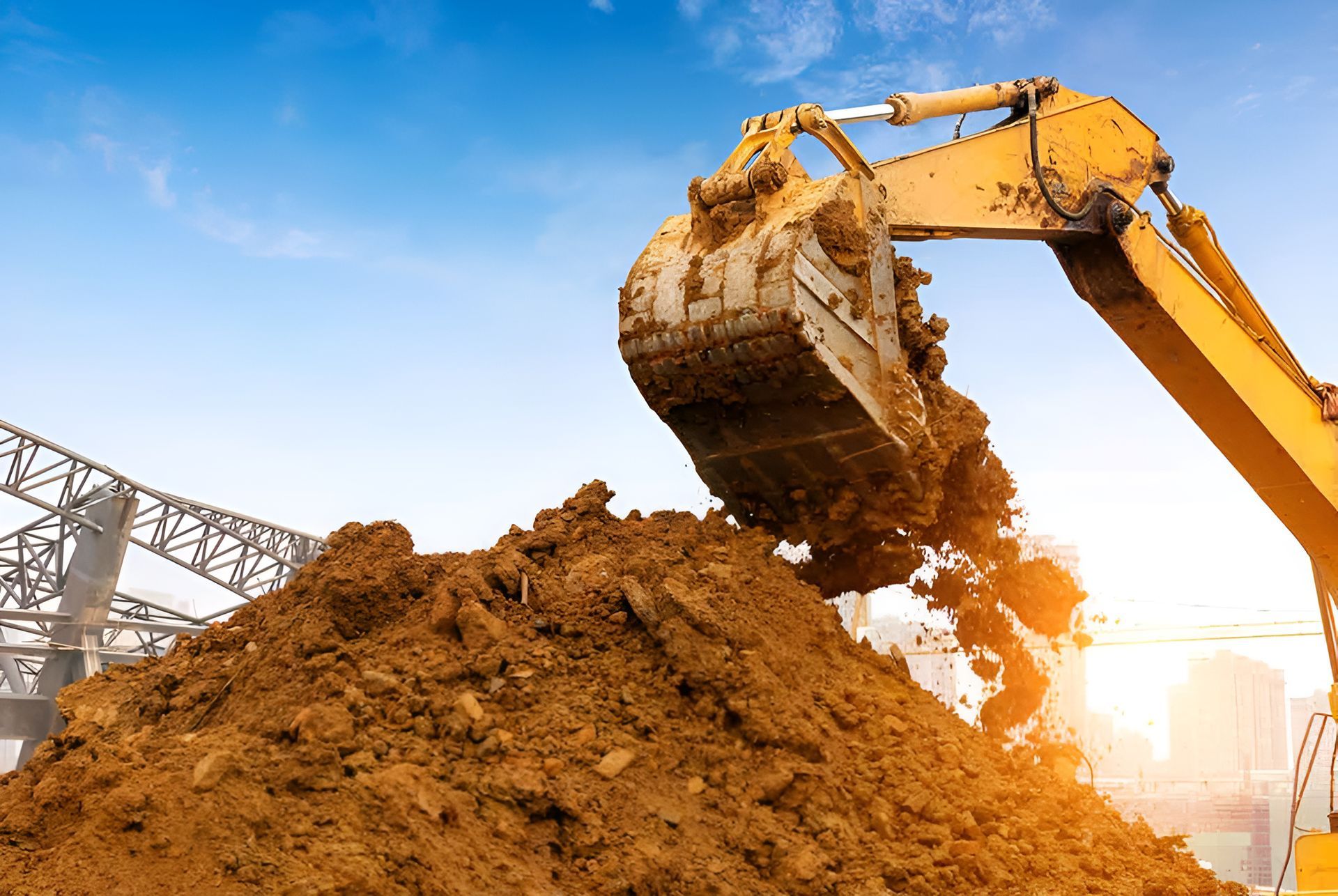 A Yellow Excavator is Digging a Pile of Dirt at a Construction Site — Boland Contracting in Wellington, NSW