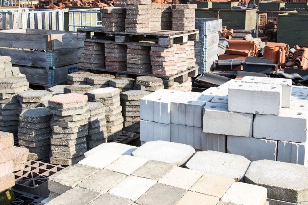 Bunch of Bricks Are Stacked on Top of Each Other in a Pile — Boland Contracting in Wellington, NSW