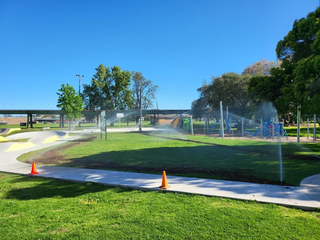 Park With Sprinklers Spraying Water on the Grass — Peel Irrigation & Water Supplies in Armidale, NSW
