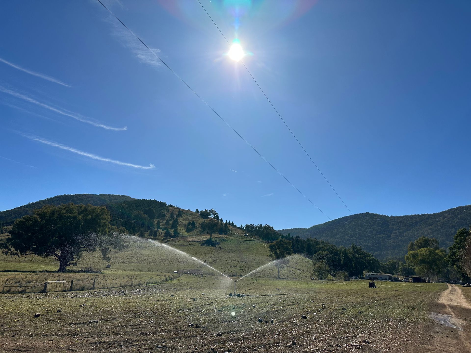 Sprinkler is Spraying Water in a Field — Peel Irrigation & Water Supplies in Taminda, NSW