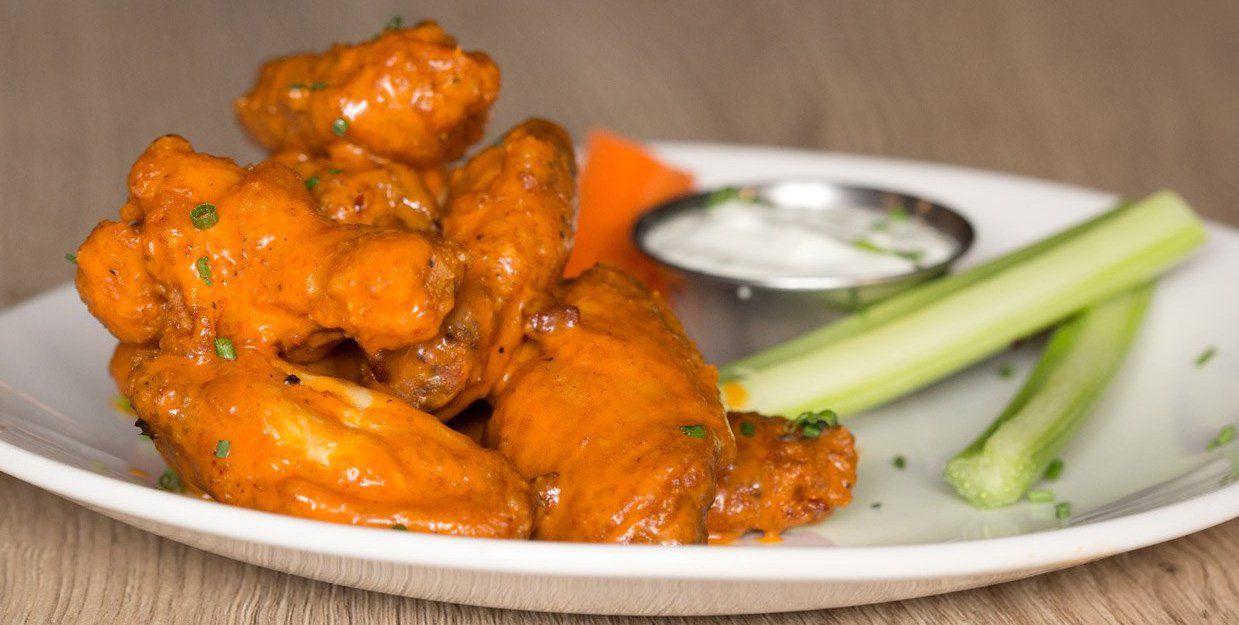 Butter Chicken Wings  from Social Eatery Winston Churchill in Mississauga