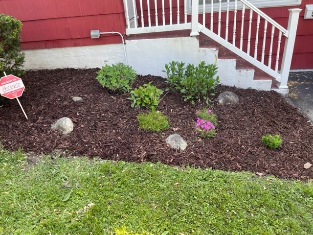 A yard with a sign that says 