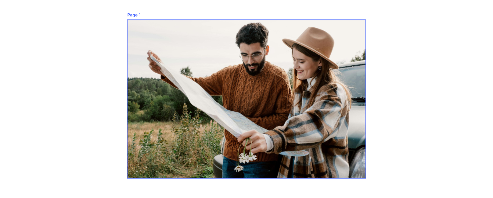 a couple looking at a map on side of road