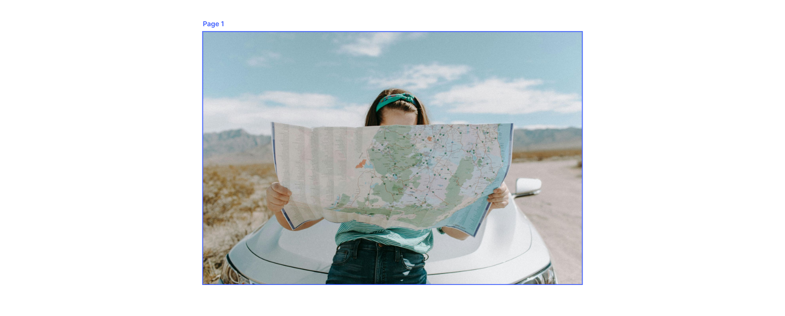 woman looking at map on side of road