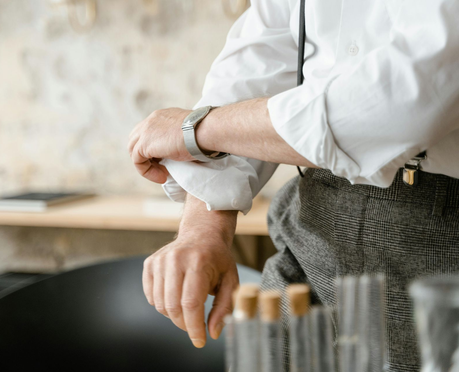 person rolling up their sleeves