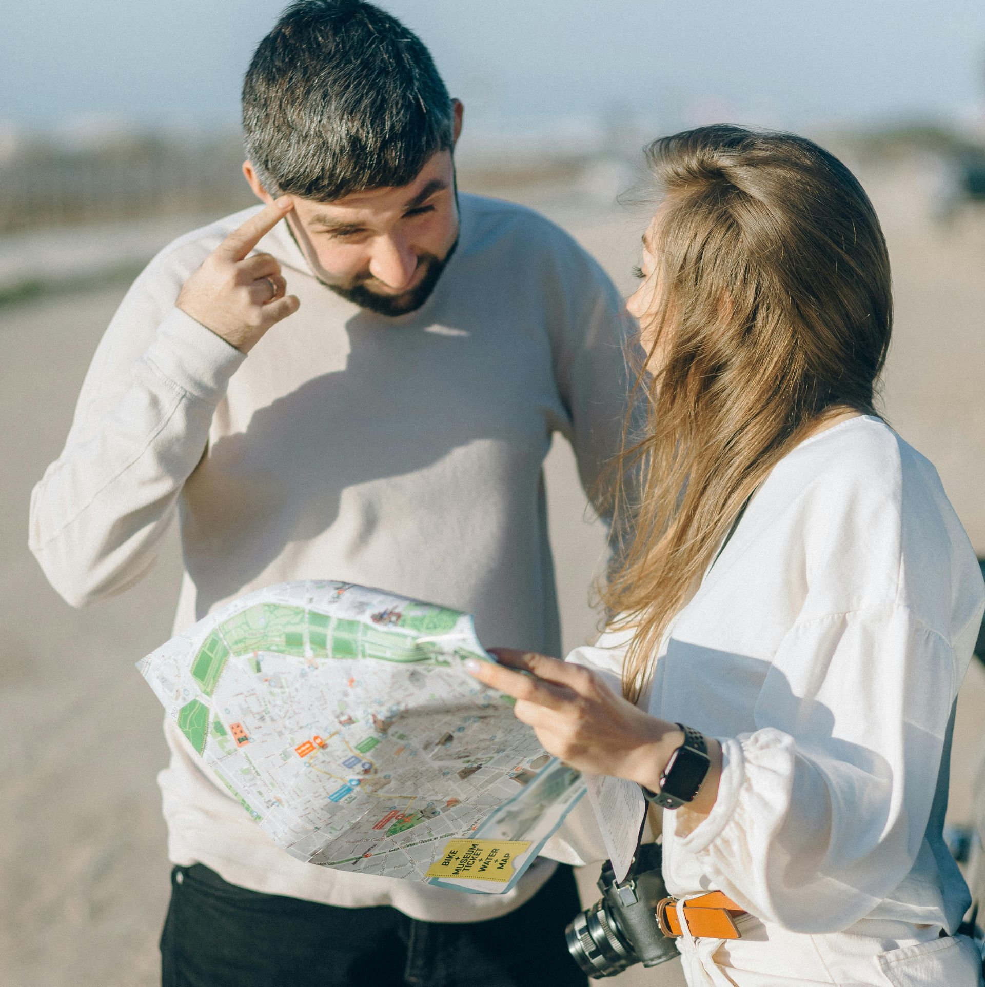 woman with map asking for directions