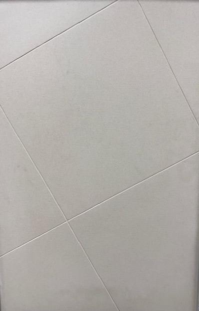 A close up of a wooden surface with a pattern on it.