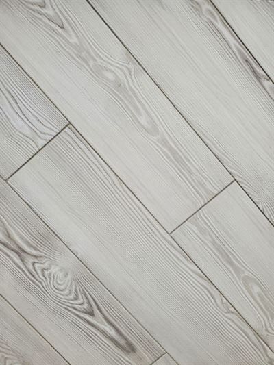 A close up of a white wooden floor with a diagonal pattern.