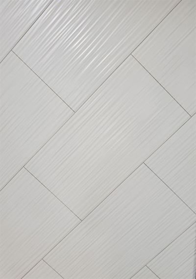 A close up of a white tile floor with a diagonal pattern.