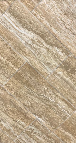 A close up of a tile floor with a marble texture.